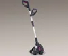 A cordless grass trimmer is shown against a plain background. Produktbild-Vorschau