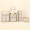 A collection of storage units and a mirror arranged in a room. Podgląd zdjęcia produktu