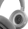 A close-up view of a gaming headset, focusing on the ear cup and internal speaker mechanism. Produktbild-Vorschau