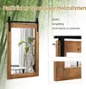A mirror with a wooden frame and a sliding barn door hardware system, set against a backdrop of bamboo. Náhled obrázku produktu