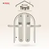 A marketing image showcasing two silver door handles against a light background with decorative elements and text. Produktbild-Vorschau