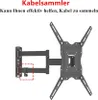 A black TV wall mount is shown against a white background. Text is present at the top of the image. Podgląd zdjęcia produktu