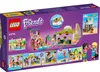 Back of a LEGO Friends Surf School playset box, showing various scenes and play features. Podgląd zdjęcia produktu