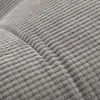 A close-up view of a textured gray fabric, likely a cushion or pillow, showing the stitching and material texture. Produktbild-Vorschau