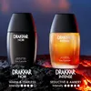Two bottles of Drakkar Noir and Drakkar Intense fragrances are displayed on a rocky surface with glowing embers, against a dark blue and black gradient background. Náhled obrázku produktu