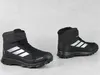 Two black Adidas Terrex winter boots are displayed against a light gray background. Náhled obrázku produktu