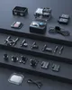 An action camera and its accessories are neatly arranged on a dark, tiered surface. Produktbild-Vorschau