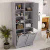 A gray bathroom cabinet with multiple shelves and two laundry baskets at the bottom, placed in a bathroom setting. Náhľad obrázku produktu