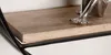 A close-up view of a wooden shelf with a metallic decorative object on it, part of a shelf unit. Voir les images du produit
