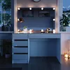 A vanity table with LED lights is set up in a room at night, with a window showing a snowy landscape. Anteprima dell’immagine prodotto