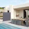An outdoor patio scene with a dining set, a pool, and a privacy screen. Anteprima dell’immagine prodotto