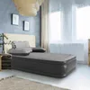 A bedroom scene with an inflatable bed set up. Náhled obrázku produktu