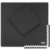 A stack of black interlocking floor mats is shown on top of a larger assembled mat. Produktbild-Vorschau