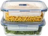 Two glass food storage containers stacked on top of each other, filled with food. Produktbild-Vorschau