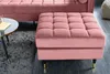 A pink velvet ottoman is placed next to a coffee table and a sofa in a living room setting. Produktbild-Vorschau