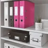 A shelf in a storage unit with several binders and storage boxes. Náhled obrázku produktu