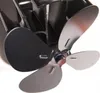 A close-up shot of a black, four-bladed fan with silver blades, likely for a stove or fireplace. Podgląd zdjęcia produktu