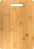 A close-up, top-down view of a bamboo cutting board with a handle cutout at the top. Produktbild-Vorschau