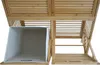 A close-up view of a bamboo bathroom cabinet with a laundry basket inside. Náhľad obrázku produktu