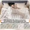 A woman sleeping under a fluffy white blanket on a bed, with a collage of different color swatches of the blanket at the bottom. Produktbild-Vorschau