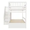 A white bunk bed with stairs and storage drawers, shown from the front. Náhled obrázku produktu