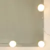 A close-up of a mirror with LED lights around the edge. Produktbild-Vorschau