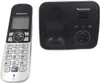A cordless phone and its charging base are shown against a white background. Voir les images du produit
