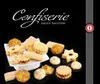 A collection of assorted cookies arranged on a black surface, with a white plate holding some of the cookies. Produktbild-Vorschau
