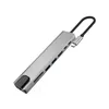 A silver USB hub with multiple ports and a black cable, isolated on a white background. Náhled obrázku produktu