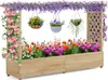 A wooden raised garden bed filled with colorful flowers and climbing plants, with hanging baskets suspended above. Produktbild-Vorschau