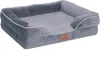 A gray orthopedic dog bed with a lighter gray sleeping surface and white piping, shown from a slightly elevated side angle on a white background. Náhľad obrázku produktu