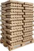 A pallet stacked with many logs of firewood. Produktbild-Vorschau