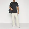 Spodnie dresowe Adidas JM9177 dla Męskie Podgląd zdjęcia produktu 4