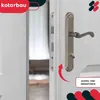 A close-up view of a door handle and lock mechanism, with an open door revealing the interior. Podgląd zdjęcia produktu