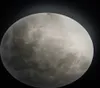A close-up view of the moon against a black background. Náhled obrázku produktu