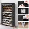 A collage of images showing a tall, black shoe rack filled with shoes, along with close-up views of its features and materials. Produktbild-Vorschau