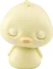 A small, yellow, cartoon-like chick figurine with closed eyes and pink cheeks. Podgląd zdjęcia produktu