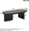 A diagram showing the dimensions of a black oval coffee table. Voir les images du produit
