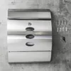 A stainless steel mailbox is mounted on a concrete wall, with mounting hardware and keys laid out nearby. Produktbild-Vorschau