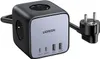A black and gray Ugreen power strip cube with multiple USB and AC outlets, and a European plug. Produktbild-Vorschau