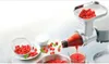A Kenwood berry press attachment is shown processing raspberries into juice, with some whole raspberries and sugar visible. Anteprima dell’immagine prodotto