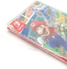 A close-up shot of a Nintendo Switch game case for Mario Party Superstars, showing Mario and a dice. Produktbild-Vorschau
