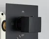 Close-up of a black shower control with a cube-shaped handle. Anteprima dell’immagine prodotto