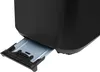 A close-up view of the crumb tray of a black toaster. Voir les images du produit