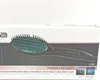 A product box featuring a straightening hairbrush. Produktbild-Vorschau