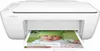 A white HP Deskjet 2130 printer is shown printing a document with a baby's face on it. Produktbild-Vorschau