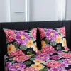 A close-up view of a bed with floral patterned bedding and two pillows. Produktbild-Vorschau