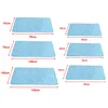 Multiple sizes of light blue pet cooling mats are displayed with their dimensions labeled. Produktbild-Vorschau