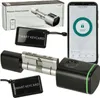 A collage of a smart lock cylinder, its packaging, a smartphone displaying the lock app, and keycards. Podgląd zdjęcia produktu