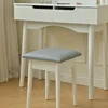 A white vanity table with a gray stool in front of it, set against a light-colored wall and a sheer curtain. Náhled obrázku produktu